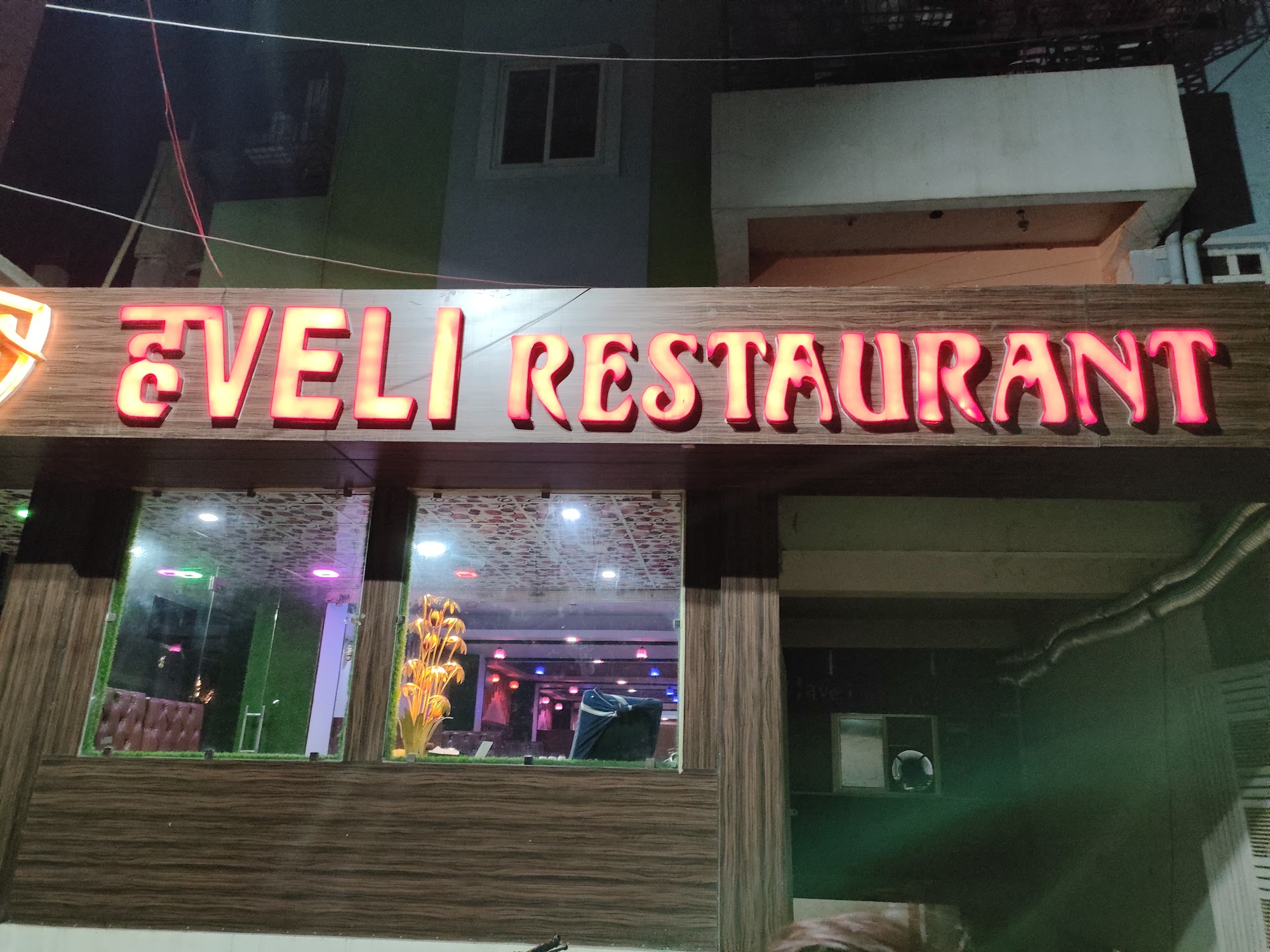Haveli Restaurant Facade Neon Sign at Night